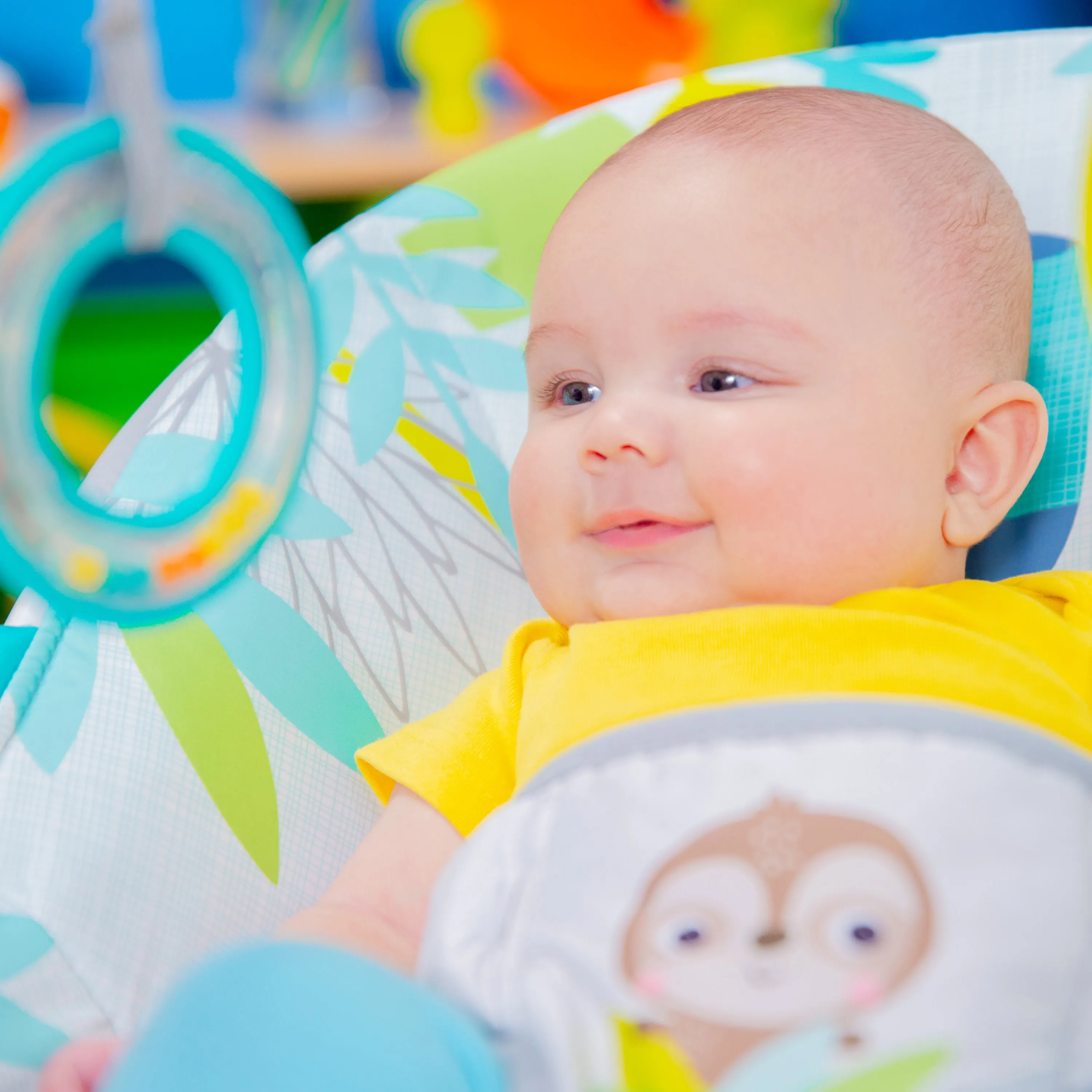 Bright Starts Rainforest Vibes Vibrating Bouncer with Toy Bar