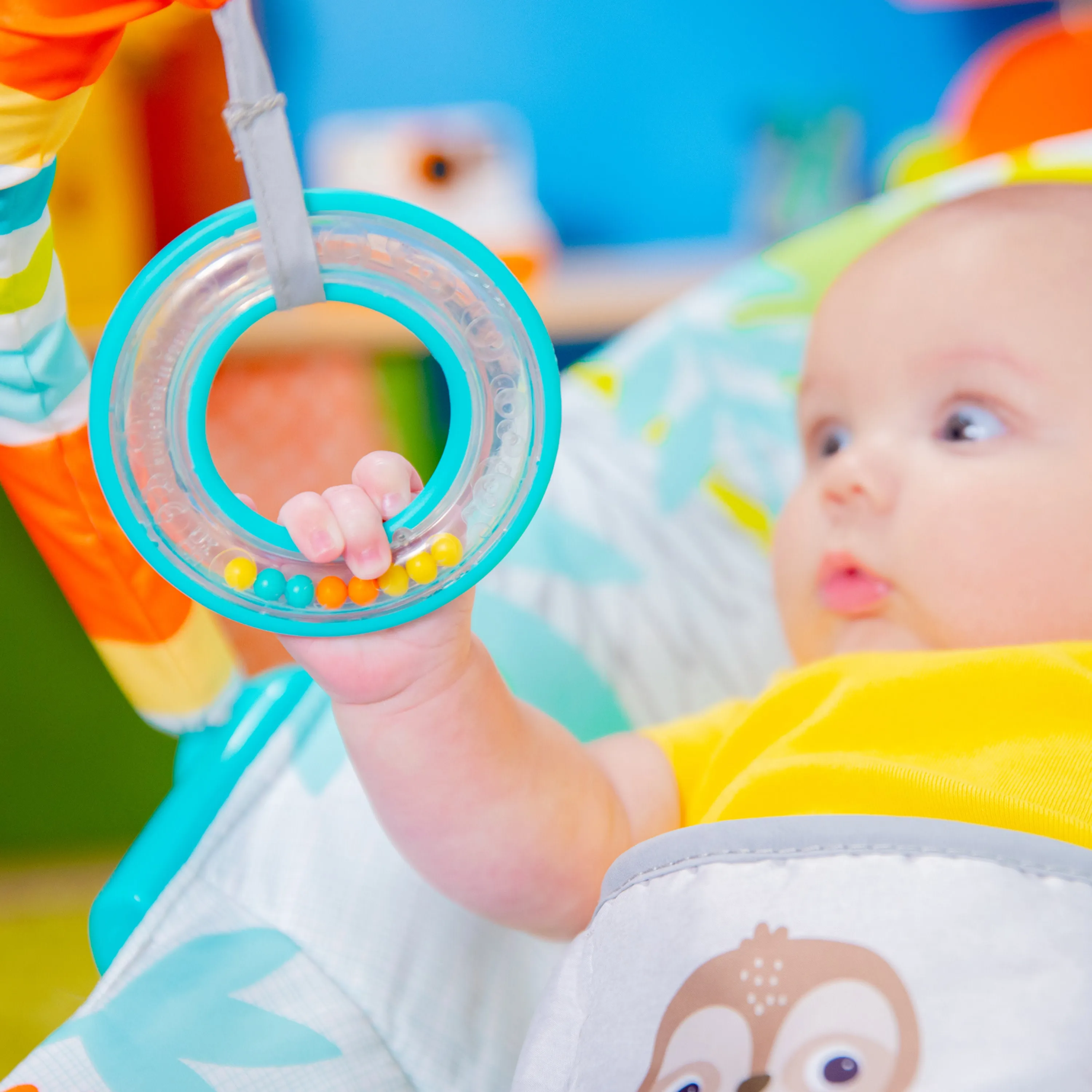 Bright Starts Rainforest Vibes Vibrating Bouncer with Toy Bar